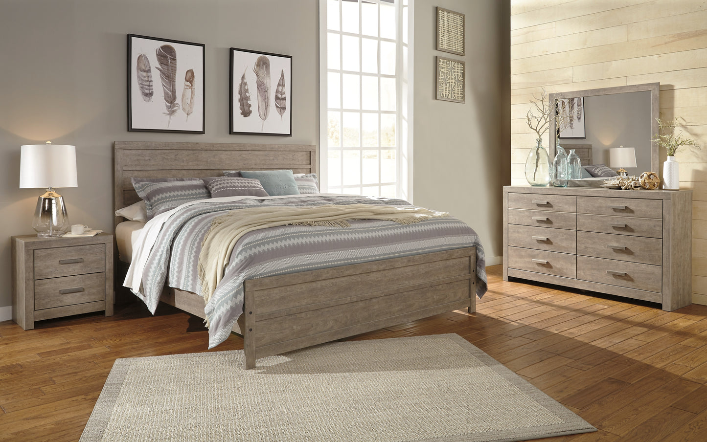 Cama con paneles Culverbach y tocador con espejo