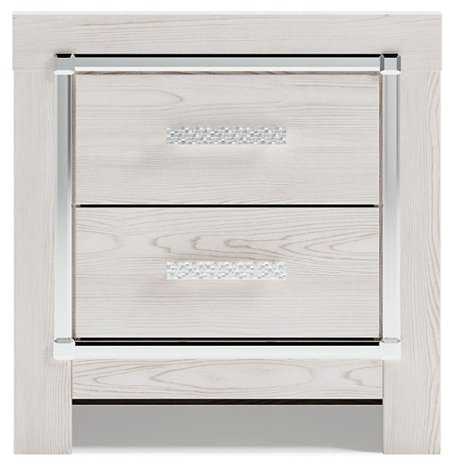 Cama Altyra tapizada con almacenaje, cómoda con espejo y mesita de noche