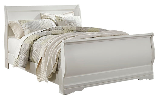 Cama tipo trineo Anarasia con tocador con espejo, cómoda y mesita de noche