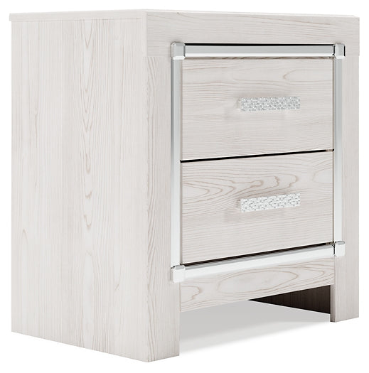 Cama Altyra tapizada con almacenaje, cómoda con espejo y mesita de noche