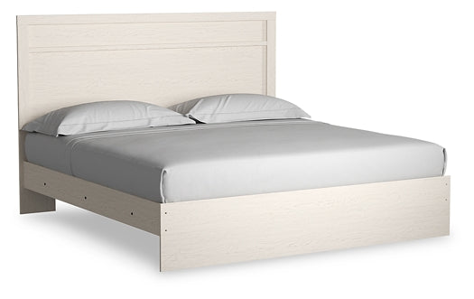 Cama Stelsie con paneles, cómoda con espejo y mesita de noche