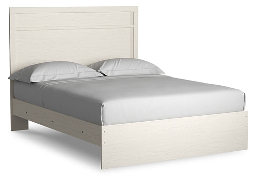 Cama Stelsie con paneles, cómoda con espejo y mesita de noche