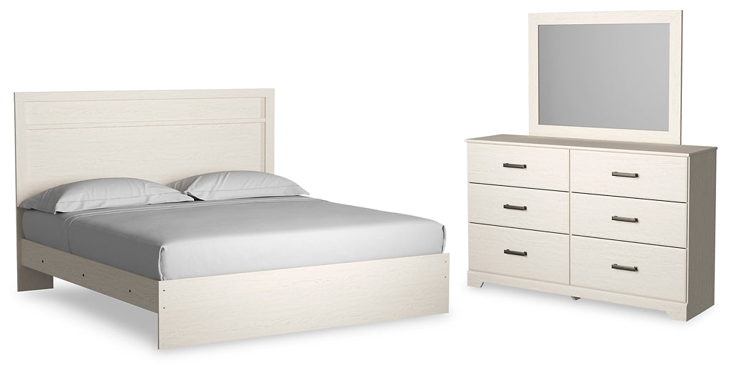 Cama Stelsie con paneles y tocador con espejo