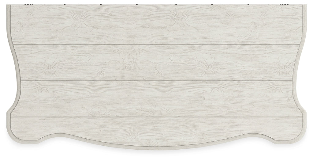 Cama tapizada Arlendyne con cómoda y espejo