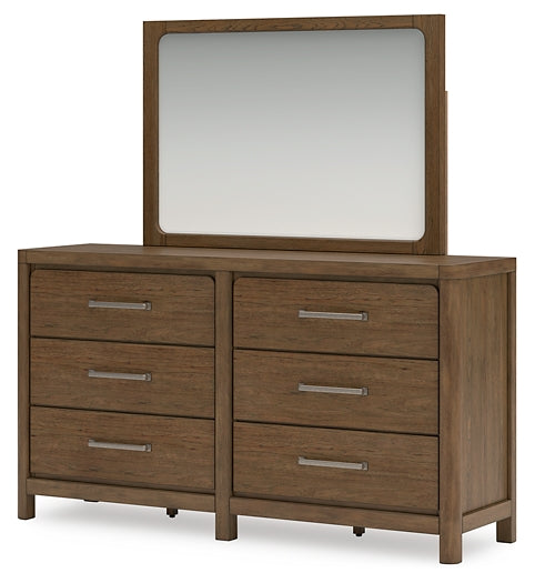 Cama tapizada Cabalynn California con cómoda con espejo, cómoda y mesita de noche