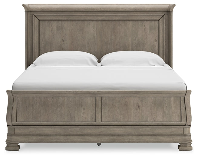 Cama tipo trineo Lexorne con cómoda y arcón con espejo