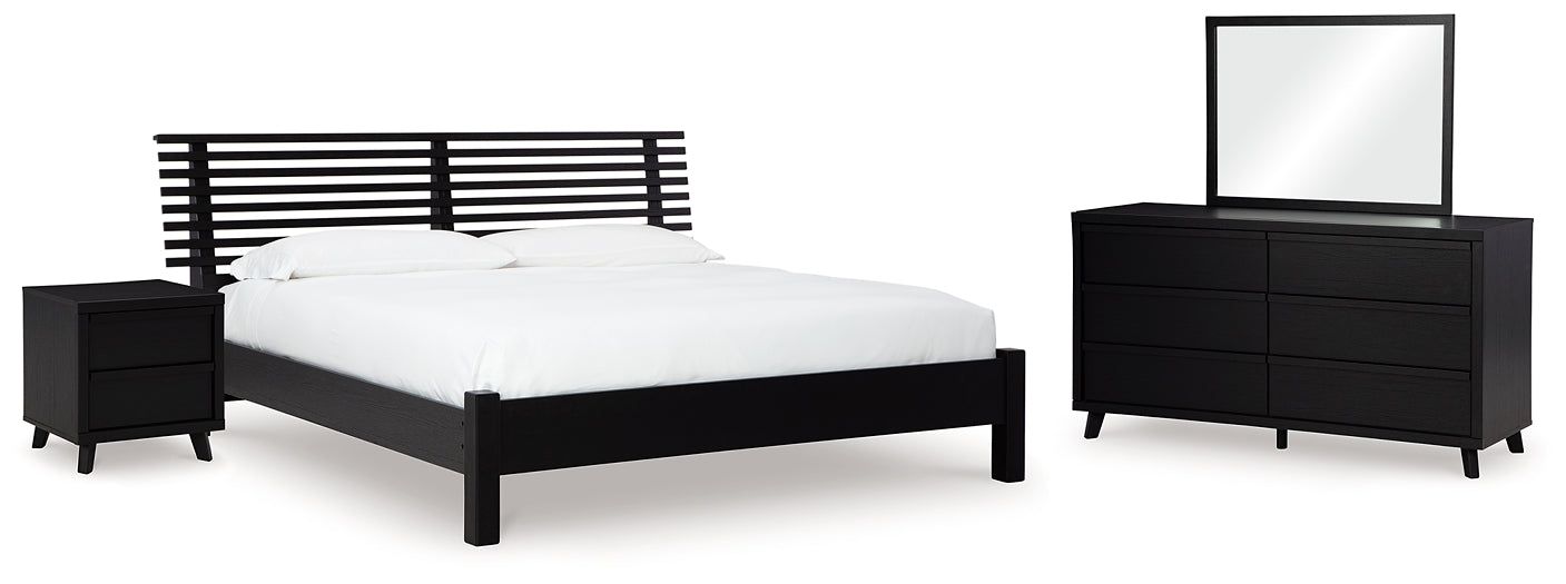Cama con paneles Danziar, cómoda con espejo y mesita de noche