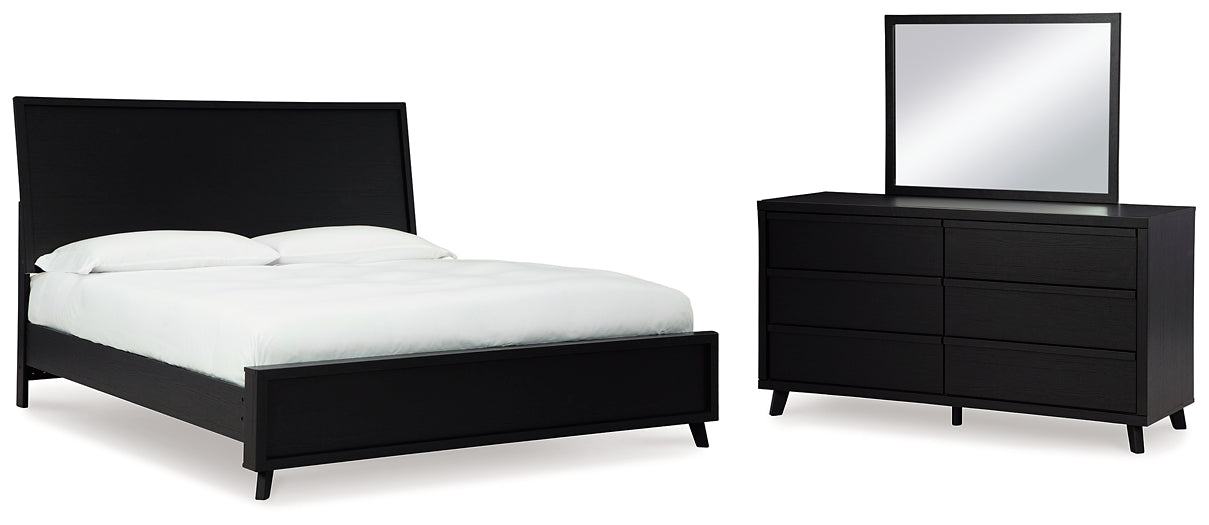 Cama con paneles Danziar y tocador con espejo