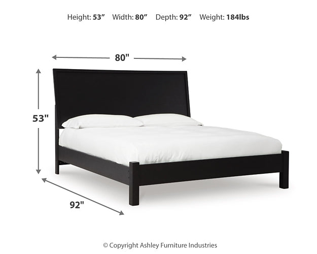 Cama con paneles Danziar y tocador con espejo