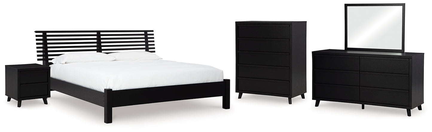 Cama con paneles Danziar, cómoda con espejo y mesita de noche