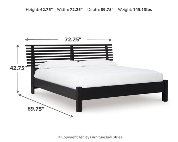 Cama con paneles Danziar y tocador con espejo