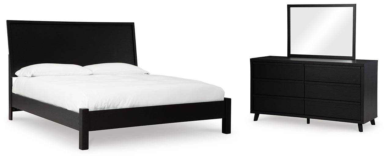 Cama con paneles Danziar y tocador con espejo