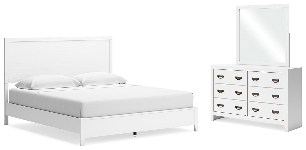 Cama con paneles Binterglen y tocador con espejo