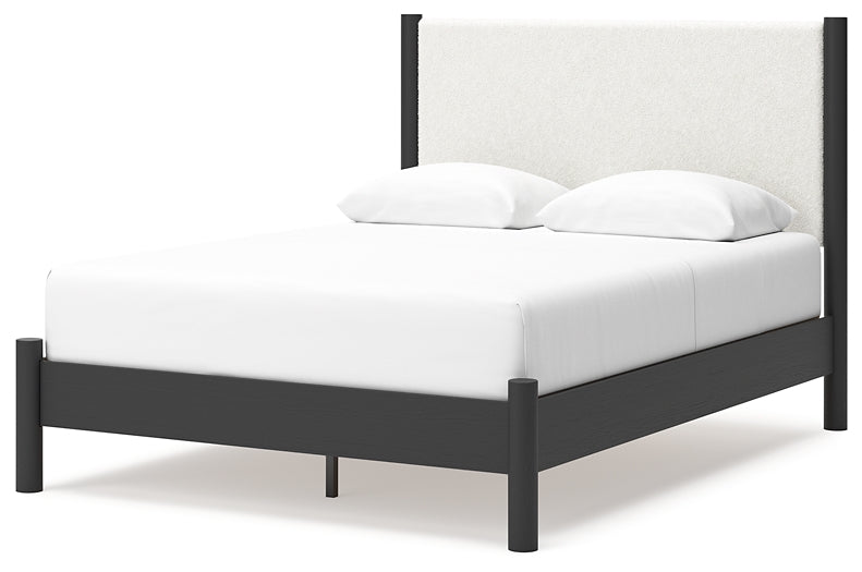 Cama Cadmori tapizada con paneles, cómoda con espejo y mesita de noche