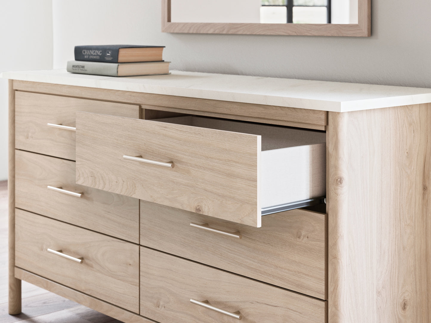 Cama Cadmori tapizada con paneles y cómoda con espejo