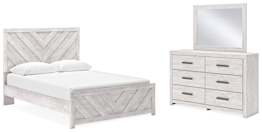 Cama con paneles Cayboni y tocador con espejo