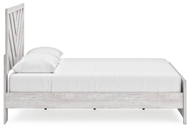 Cama con paneles Cayboni y tocador con espejo