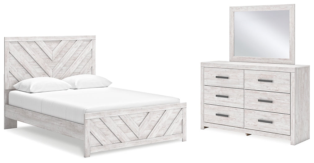 Cama con paneles Cayboni y tocador con espejo