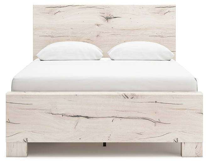 Cama con paneles Lawroy y tocador con espejo