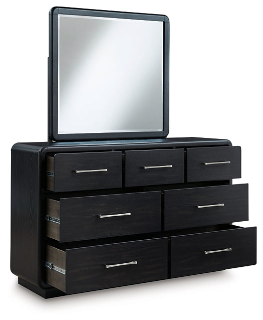 Cama tapizada Rowanbeck con paneles y tocador con espejo