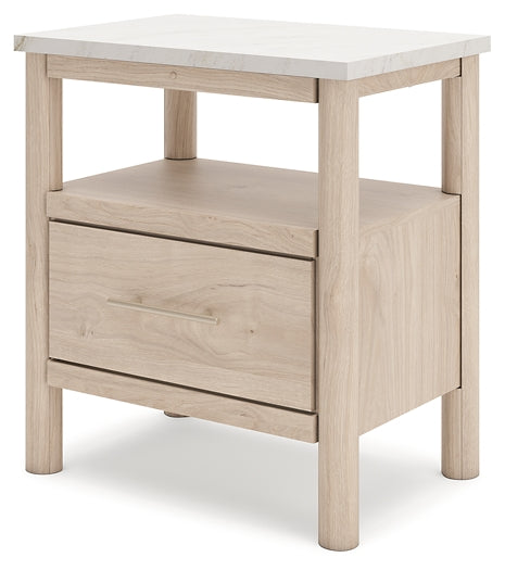 Cama Cadmori tapizada con paneles, cómoda con espejo y mesita de noche