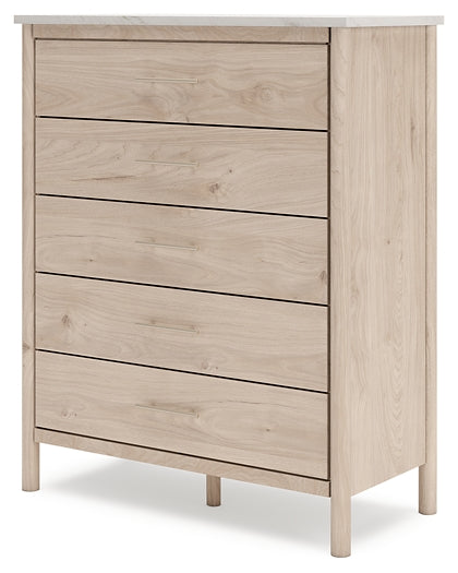 Cama Cadmori tapizada con paneles, cómoda y espejo