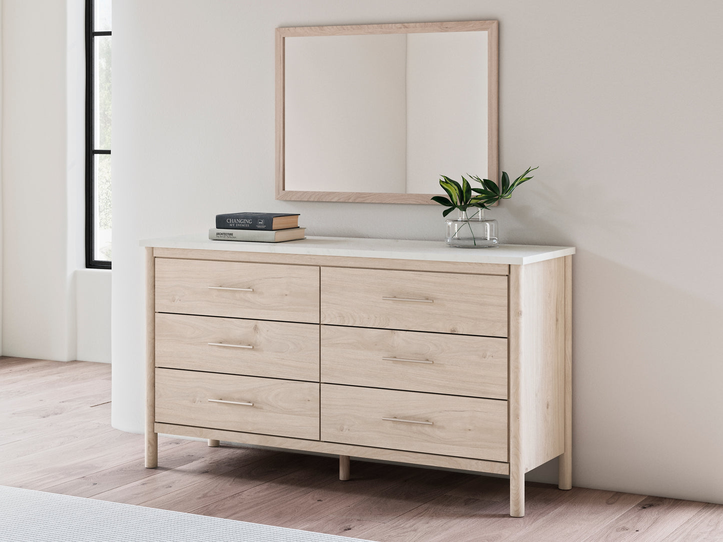 Cama Cadmori tapizada con paneles, cómoda y espejo
