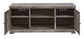 Mueble para TV Wynnlow de 63" con chimenea eléctrica