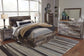 Cama con paneles Derekson y 4 cajones de almacenamiento