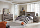 Derekson  Panel Headboard With Mirrored Dresser, Chest And Nightstand