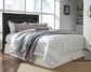 Cama con paneles Brinxton y tocador con espejo