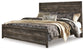 Cama con paneles Wynnlow y tocador con espejo