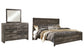 Cama con paneles Wynnlow y tocador con espejo