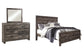 Cama con paneles Wynnlow Crossbuck y tocador con espejo