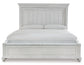 Cama con paneles Kanwyn, cómoda con espejo y mesita de noche