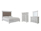 Cama con paneles Kanwyn, cómoda con espejo y arcón