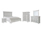 Cama Kanwyn con paneles y espacio de almacenamiento, con tocador con espejo, cómoda y mesita de noche