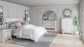 Cama Altyra con paneles, cómoda con espejo y mesita de noche