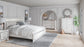 Cama Altyra con paneles, cómoda y espejo