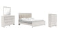 Cama Altyra con paneles, cómoda y espejo