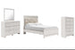 Cama Altyra con paneles, cómoda y espejo