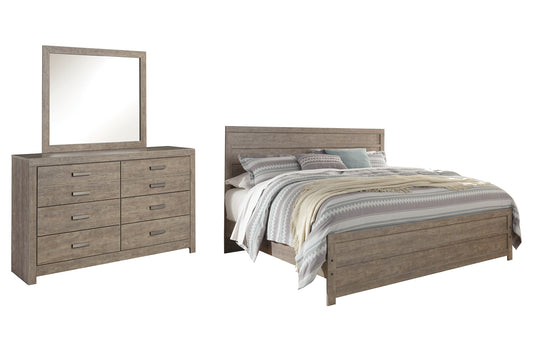 Cama con paneles Culverbach y tocador con espejo