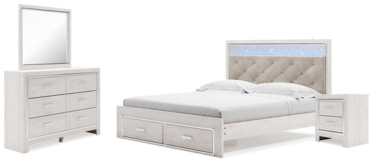 Cama Altyra tapizada con almacenaje, cómoda con espejo y mesita de noche