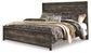Cama con paneles Wynnlow, tocador con espejo y mesita de noche
