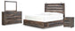 Cama Drystan con dos cajones, cómoda con espejo y mesita de noche