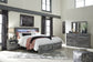 Cama Baystorm con dos cajones, cómoda con espejo y mesita de noche
