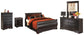 Cama estilo trineo Huey Vineyard con tocador con espejo, cómoda y mesita de noche