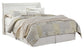 Cabecero de cama estilo trineo Anarasia con cómoda y espejo