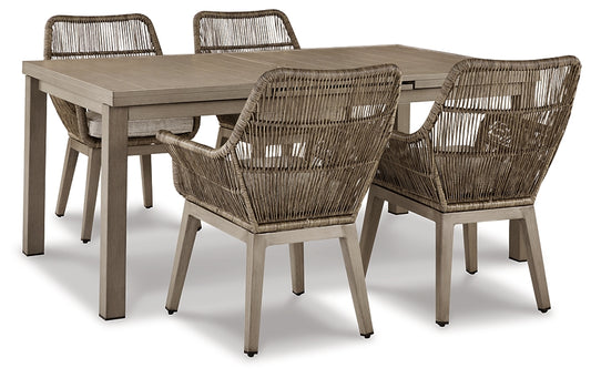 Mesa de comedor exterior frente a la playa y 4 sillas
