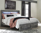 Cama Baystorm con dos cajones, cómoda con espejo y mesita de noche